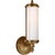 Merchant Single Bath Light in Hand-Rubbed Antique Brass with White Glass Designer: Thomas O'Brien Height: 12.25"...