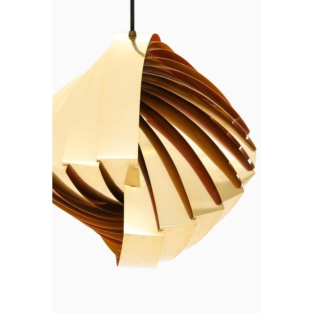 The konkylie ceiling lamp, designed by louis weisdorf and produced by lyfa in denmark, is a remarkable example of mid-...