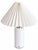 Elegant vintage Danish table lamp dating from the 1970s, featuring a beautifully simple cylindrical base in white opaline...