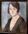 Pál Fried 1893 Budapest - 1976 New York City Three-quarter portrait of a young, dark-haired woman with a black top and...