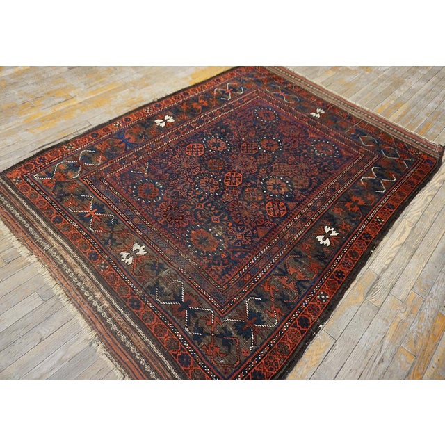 19th Century Afghan Baluch Carpet ( 4'4" x 6'9" - 132 x 206 ) Baluch A name given to (mostly) pile rugs woven by Indo-...