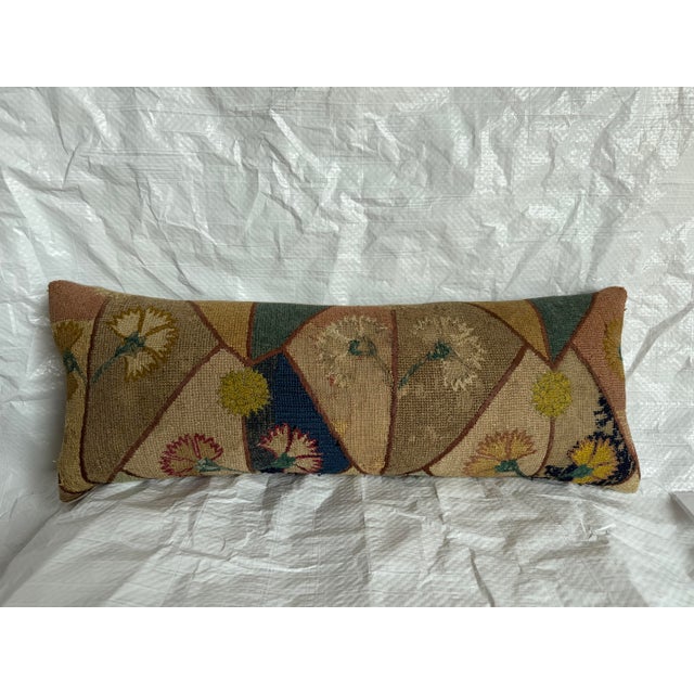 This antique 17th-century Italian Florentine tapestry pillow is fashioned from a surviving fragment of an early decorative...