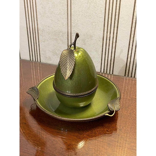 Beautiful Evans hand-enameled green pear lighter with tray. Features a vintage design with gold braided trim and...