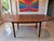 This exquisite teak extending dining table was designed and crafted by a.h. Mcintosh in the 1960s — a true statement piece...