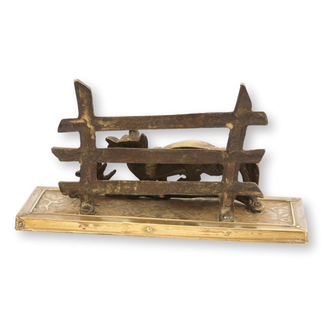 Early 20th century English brass letter rack featuring a fox in motion before a rustic fence backdrop. The well detailed...