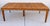 Warm wood tones, expressive grain, and sculptural chair backs give this vintage Heywood-Wakefield dining set its...