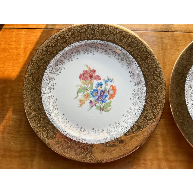 Pair of vintage Edgewood 22K gold gilt botanical floral porcelain plates. Each decorative plate is 10” in diameter and...
