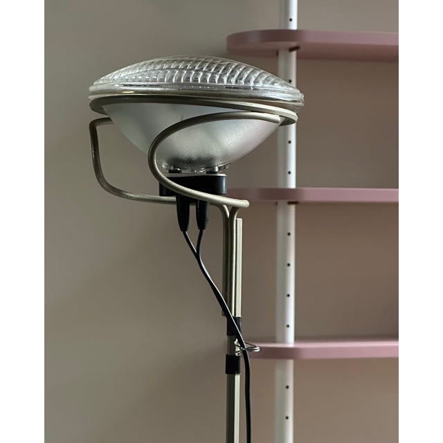 The "Toio" floor lamp, designed by Achille and Pier Giacomo Castiglioni, manufactured by Flos, 1960s, Italy. Floor lamp...