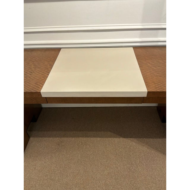 Stylish Baker Barbara Barry Waterfall Desk. Brown wood with leather top in the middle. 3 drawers. Original Retail $9027....