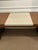 Stylish Baker Barbara Barry Waterfall Desk. Brown wood with leather top in the middle. 3 drawers. Original Retail $9027....
