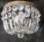 Cut crystal-beaded basket with an embossed Art Nouveau brass ceiling band. The measurements are 10.25" in diameter and...
