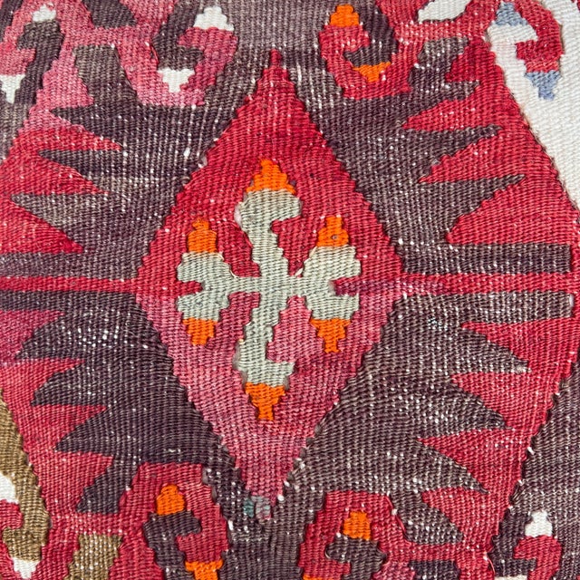 Crafted from an authentic vintage Turkish kilim rug, this one-of-a-kind pillow showcases the bold artistry and flatwoven...