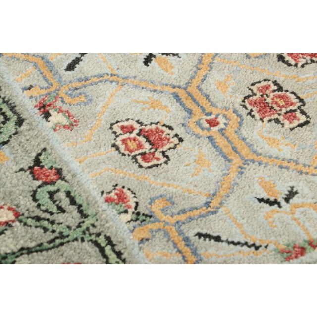 Hand-knotted in wool, this 2x3 classic oriental rug from Rug & Kilim showcases a refined composition of floral and...