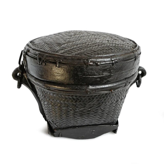 Vintage Akha Thai hand woven round basket with lid. Rich dark finish with signs of age and use. Circa mid 20th century.