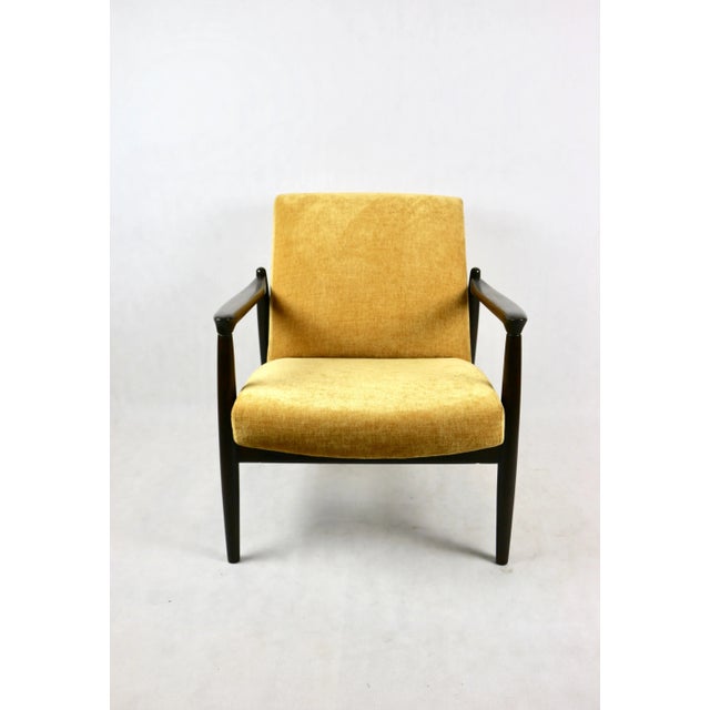 - A vintage easy chair - model GFM-64 - Designed by Edmund Homa - from the 1970s - Reupholstered in structural fabric in...