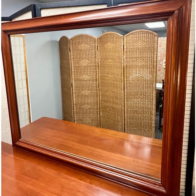 Cherry Dresser and Night Stand Solid cherry nine drawer dresser with mirror from the Willett furniture Wildwood...