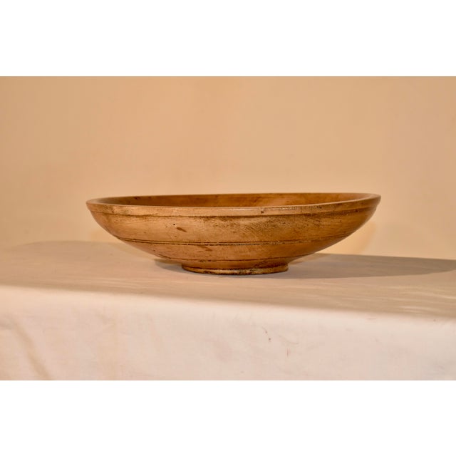 19th century hand turned bowl from England made from Sycamore. This bowl has attained a lovely patina over time and has...