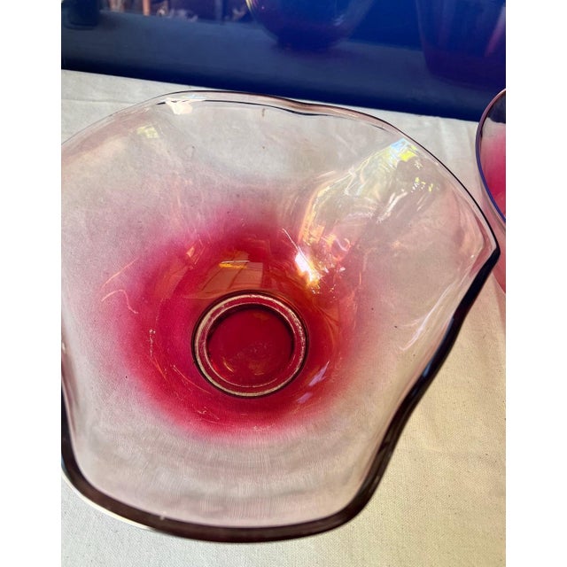 Up for consideration is a beautiful pair of pink glass serving bowls. These would look lovely in your home and they are a...