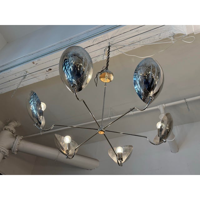 Design Plus Gallery presents a NauticalMart Mid-Century Modern Perforated Sputnik Chandelier. This sculptural six-light...