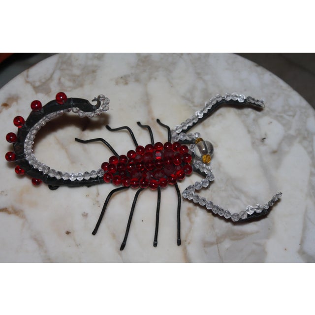 1950's French Modernist Black Iron with Ruby Red, Clear, Gold Cut and Polished Crystal "Scorpion" Sculpture. Has iron...