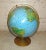 This vintage tabletop globe sits in a metal stand and can add a worldly decorative style to any room or office. WEAR Wear...