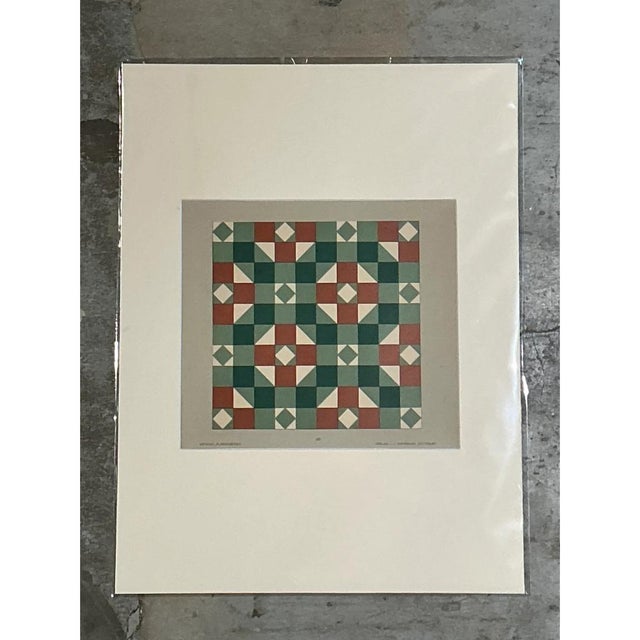 This vintage serigraph on paper features a bold, eye-catching geometric tile pattern that showcases a meticulous...