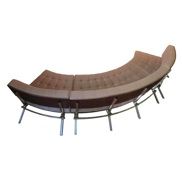 The Halô sectional sofa gets its name from the stainless-steel stretcher which curves around its back legs. The view from...