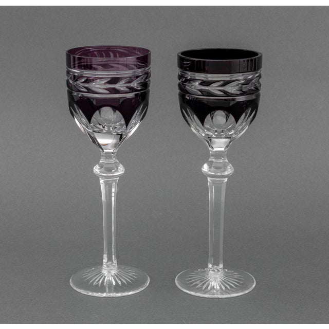 Group of Seven Bohemian Cut-Crystal Wine Glasses, comprising: (6) six in purple and (1) one dark ruby red. 8.75" H x 3"...