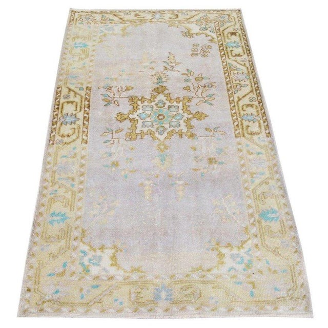 Hand-knotted with care using traditional rug-making techniques, this wool rug blends timeless craftsmanship with a modern...