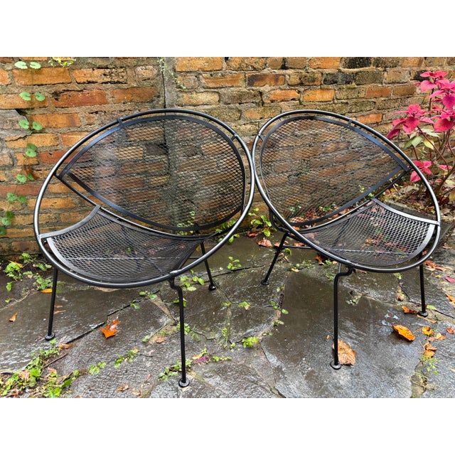 truly iconic design,Works inside or outside!! heavy iron frame with metal mesh seat and back. Dimensions: W: 30″ D: 27.75″...