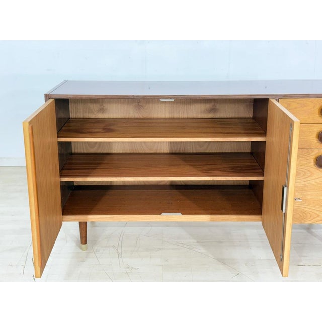 Beautiful, versatile sideboard from the 1970s, originally from the Czech Republic. The piece features four practical...
