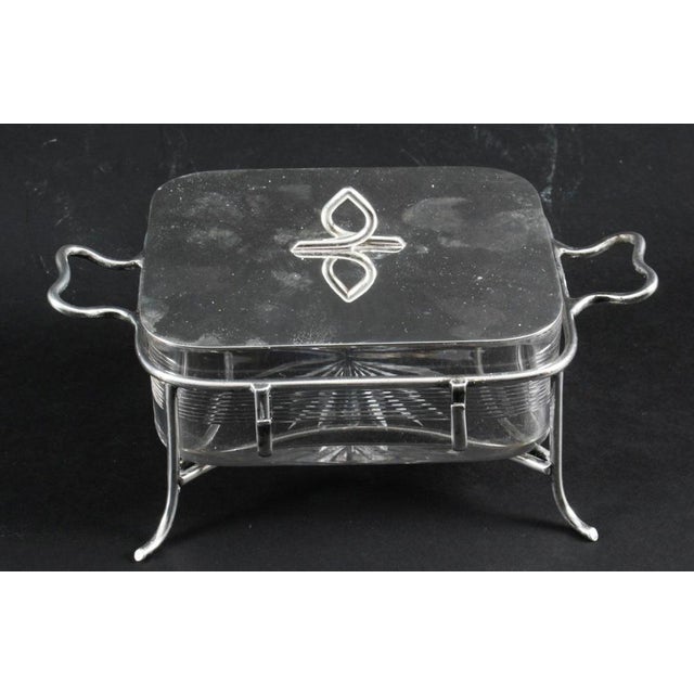 This is a superb silver plated and cut glass butter / sardine dish, by the renowned retailer and silversmith Mappin &...