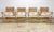 A set of 4 natural rattan/reed and aluminum chairs made by Telescope Furniture Company circa 1970’s featuring gold...