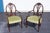 This exceptional set of 12 Adams Style carved mahogany dining chairs, dating to circa 1960s, captures the refined...