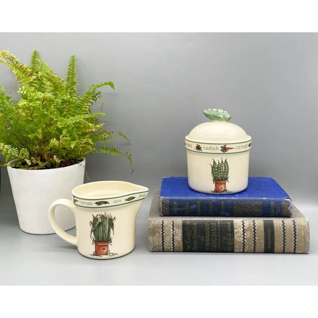 Adorable matching sugar and creamer set made in 1997 by Otagiri. Maker's mark is on the underside and the designer, Mary...