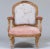 The chair is a copy of a suite of chairs by Nicholas Quinebert Foliot made for the Petit Trianon circa 1765-70. An...