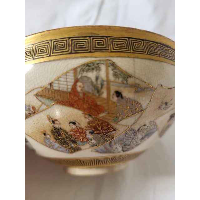 This exquisite Japanese Satsuma earthenware tea bowl (chawan) dates to the late Meiji period (circa 1890) and exemplifies...