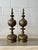A striking pair of monumental patinated brass decorative finials executed in the luxurious neoclassical manner of...