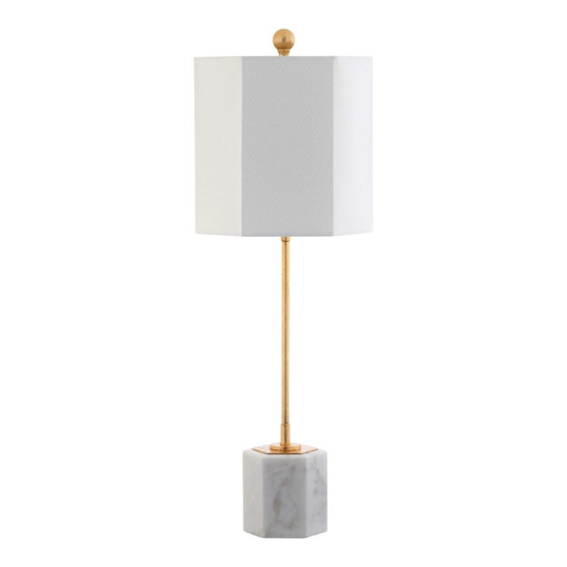 A blend of modern minimalist lines and luxurious material, this contemporary marble table lamp brightens any living room....
