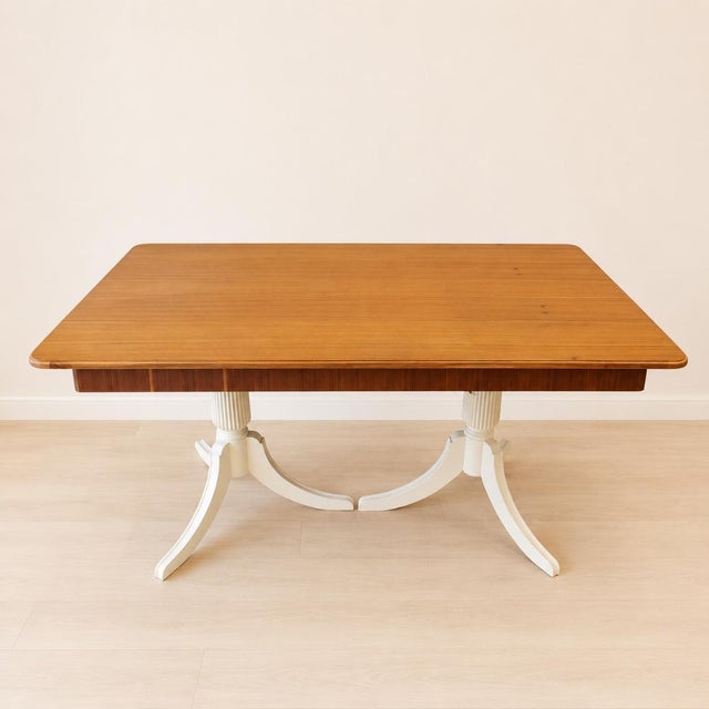 Vintage teak dining table, made in Barcelona, ​​Spain in the 1950s, restored and full of character. The teak veneer top...