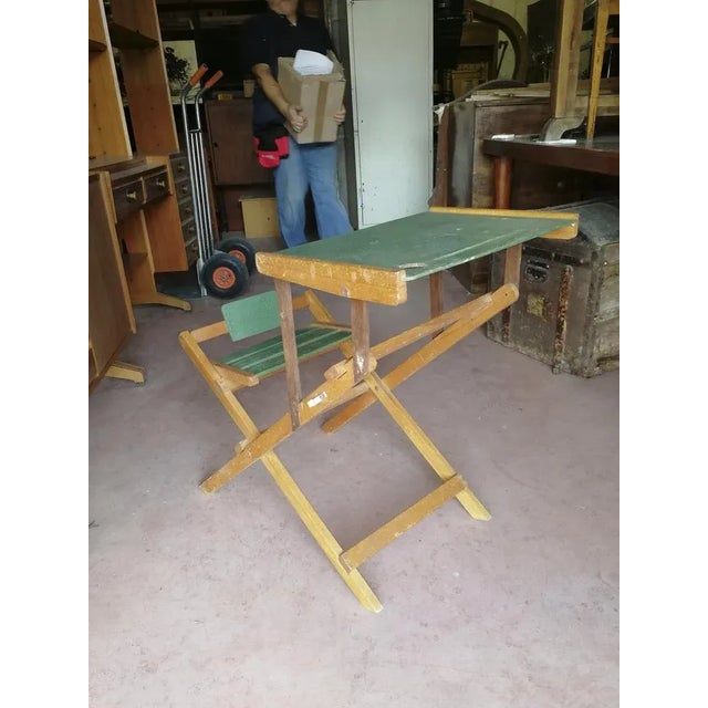 Dressing table made of honeycomb sandwich and walnut veneered plywood with shaped mirror. The lower part has two doors...