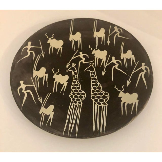 Vintage Decorative Pottery Wall Plate with African Jungle Motives. No maker mark.