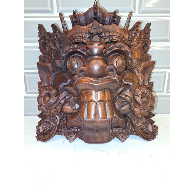 An extraordinary, gallery-grade mid-century Balinese ritual guardian wall mask depicting the protective forest deity Boma...