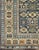 Measures: 3'3'' x 4'5''. The field of this Caucasian piece features all-over tribal motifs and shapes decorated with small...