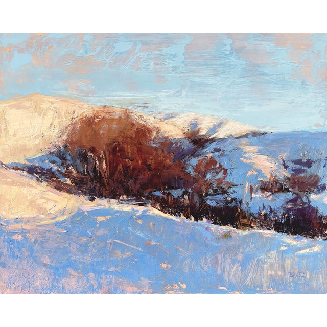 This oil on panel painting captures a serene winter landscape, where rolling hills are blanketed in soft snow, contrasting...