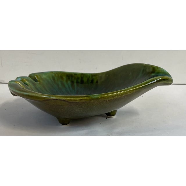 Pretty iconic avocado green mid Century ash tray! Marked Wade USA on bottom.
