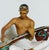 Large Glazed Porcelain Bantang Figurine of an Indonesian Boy Playing a Sitar by Le Bertettin, Italy, 1930s For Sale - Image 4 of 10