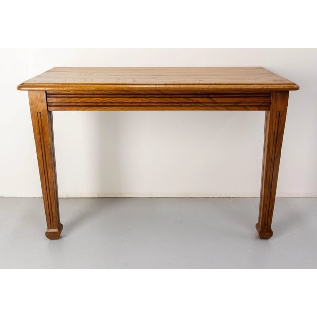 French Art Déco wall console made circa 1940. It was made from an original oak dining table which has been transformed...