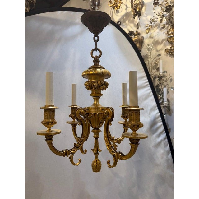 Circa 1900’s gilt bronze chandelier with 4 lights, very nice flowers design