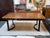 Design Plus Gallery presents a Leviathan Smoked Acacia Live Edge Dining Table from Sobu Designs. This table is made from...
